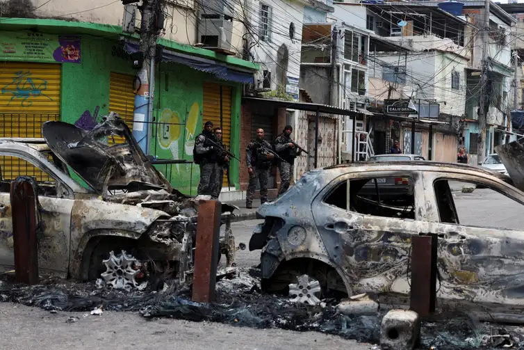 Members of the military police special unit patrol a street during a police operation against drug trafficking at the favela do Penha, in Rio de Janeiro, Brazil October 28, 2025. REUTERS/Aline Massuca